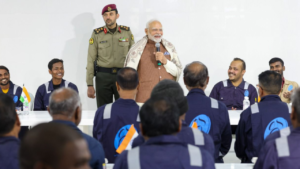 Read more about the article PM Modi meets Indian migrant workers at Gulf Spic Labour Camp in Kuwait