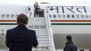 Read more about the article Unique display of camaraderie: Macron comes to airport to bid farewell to PM
