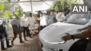 Read more about the article Watch: Maharashtra deputy CM Eknath Shinde rides Tesla outside Vidhan Sabha; calls it big deal for state