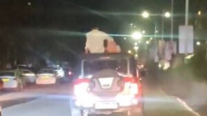 Read more about the article Watch: Couple perform stunts on car roof in Pune; video goes viral